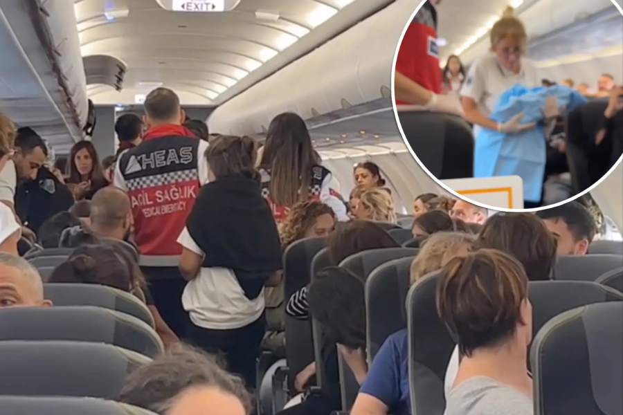 Airplane cabin filled with passengers and emergency responders in red and white vests labeled "Acil Sağlık" (Emergency Health), attending to a situation mid-flight. An inset shows a woman holding what appears to be a newborn wrapped in blue fabric.