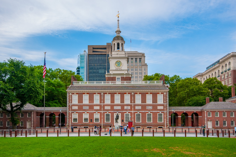 Independence Hall in Philadelphia stands with its iconic brick façade and clock tower, where the Declaration of Independence was signed.