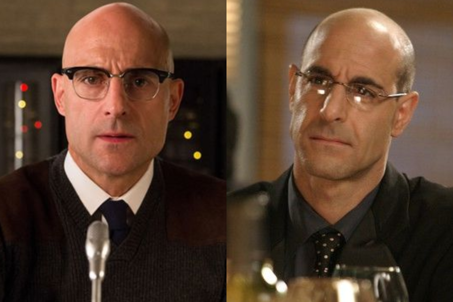 Side-by-side photo of two bald men wearing glasses and formal attire, both with serious expressions. The man on the left wears a white shirt, tie, and dark sweater, while the man on the right wears a dark shirt, tie, and suit jacket.