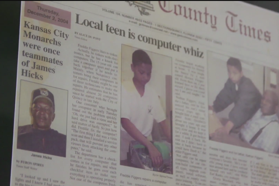A newspaper article titled “Local teen is computer whiz” showing a young boy repairing a computer and sitting with an elderly man, alongside another feature about James Hicks.