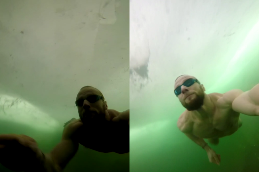 Split-screen of a man swimming underwater beneath a frozen lake, wearing goggles and pushing toward the surface in murky green water.