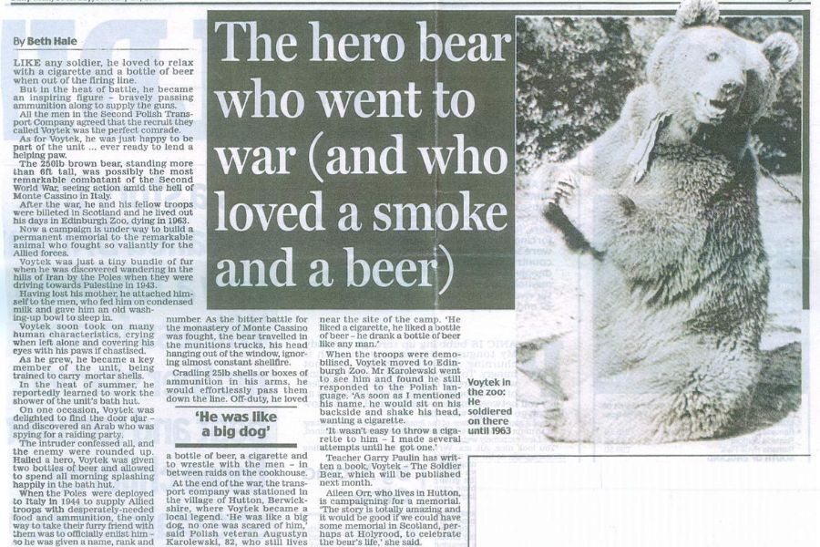 A newspaper clipping featuring a photo of Wojtek the bear upright and waving, with a bold headline reading "The hero bear who went to war (and who loved a smoke and a beer)."