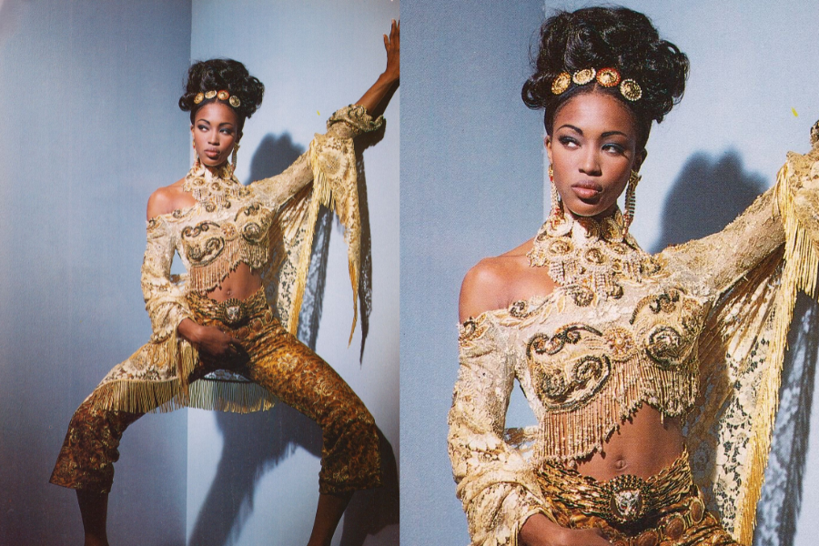 Model in a gold, heavily embellished crop top and fitted pants poses dramatically against a wall, with ornate accessories and a high updo. The second photo focuses on her regal expression and gold detailing.