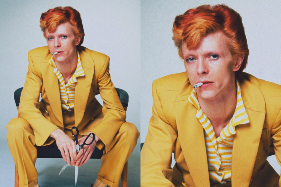 Man with bright red hair wearing a vivid yellow suit over a striped shirt sits with a cigarette and scissors in hand. Second image zooms in on his intense gaze and vibrant outfit.