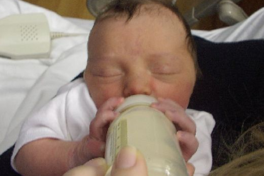 Baby drinking from his bottle
