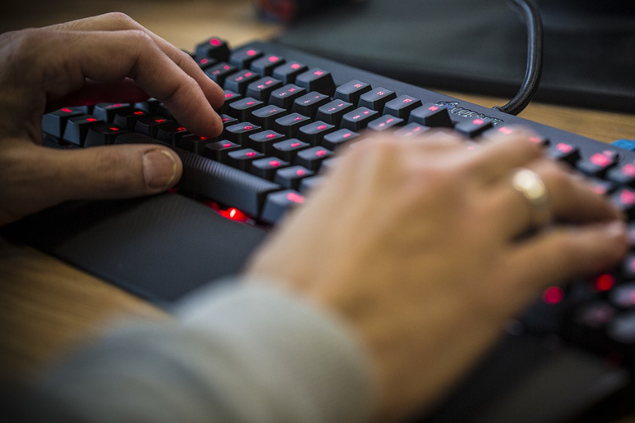 Male hands on a keyboard