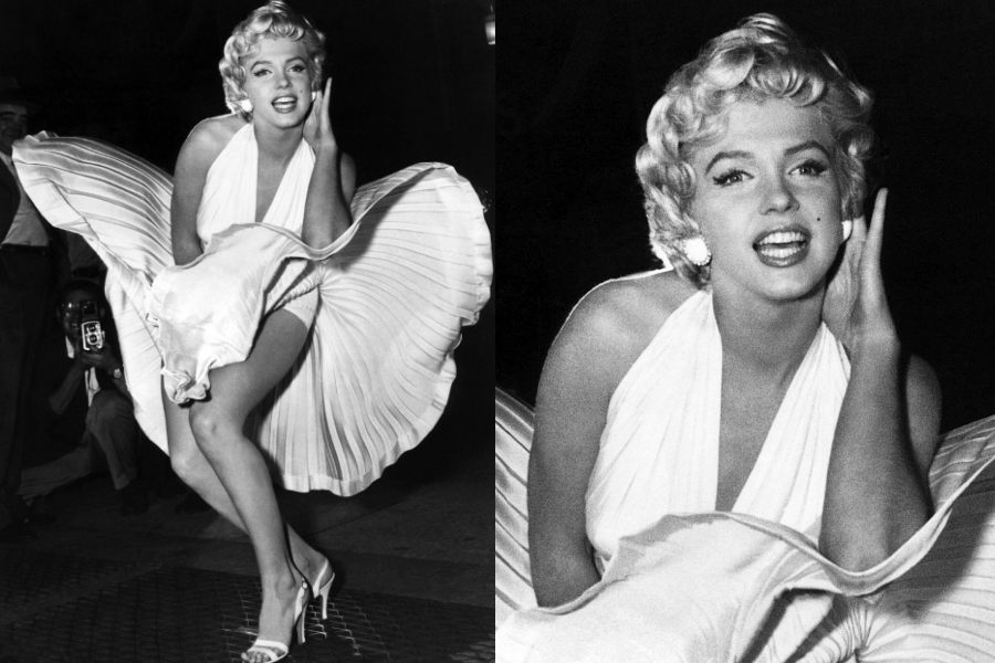 Iconic black and white image of a woman in a white halter-neck pleated dress caught mid-air over a subway grate, holding it down with a playful smile. Close-up highlights her classic blonde curls, winged eyeliner, and glamorous expression.
