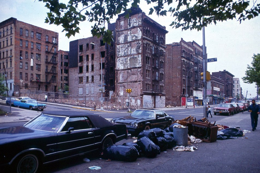 The Bronx in the 1980s. Dirty, empty street on a clowdy day.