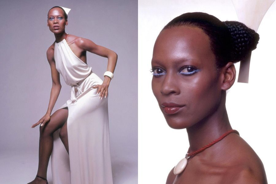 A poised model in a white, high-slit gown poses against a plain backdrop, with close-up showing futuristic blue eye makeup and braided hair.